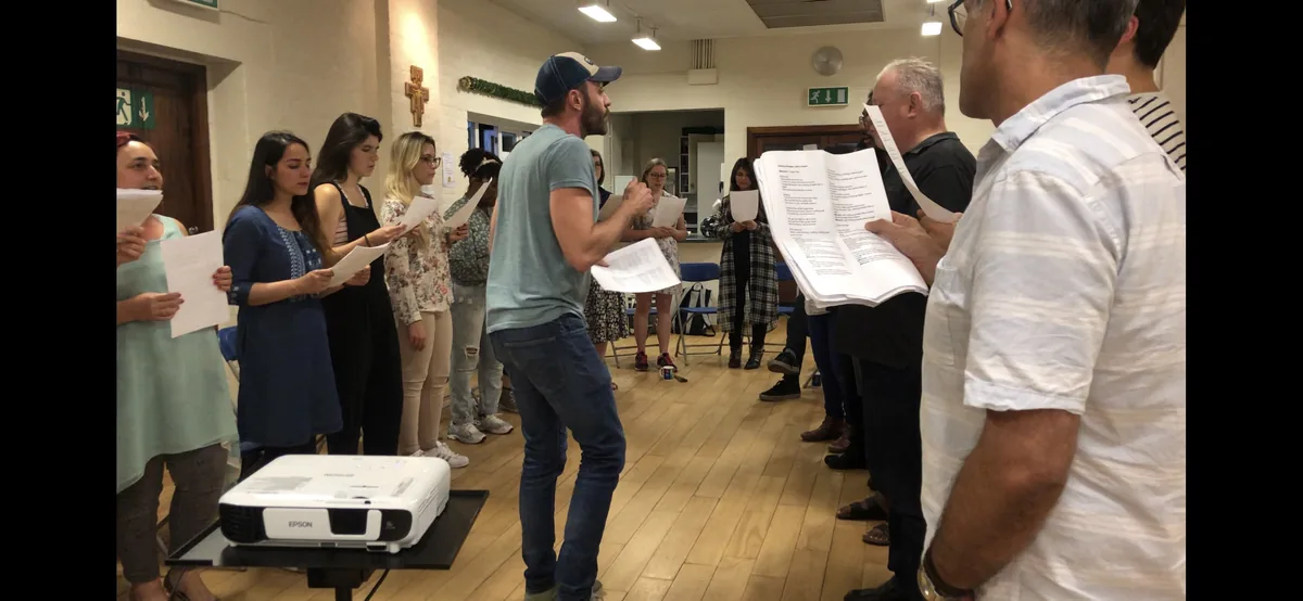 Matt Thompson working with a singer